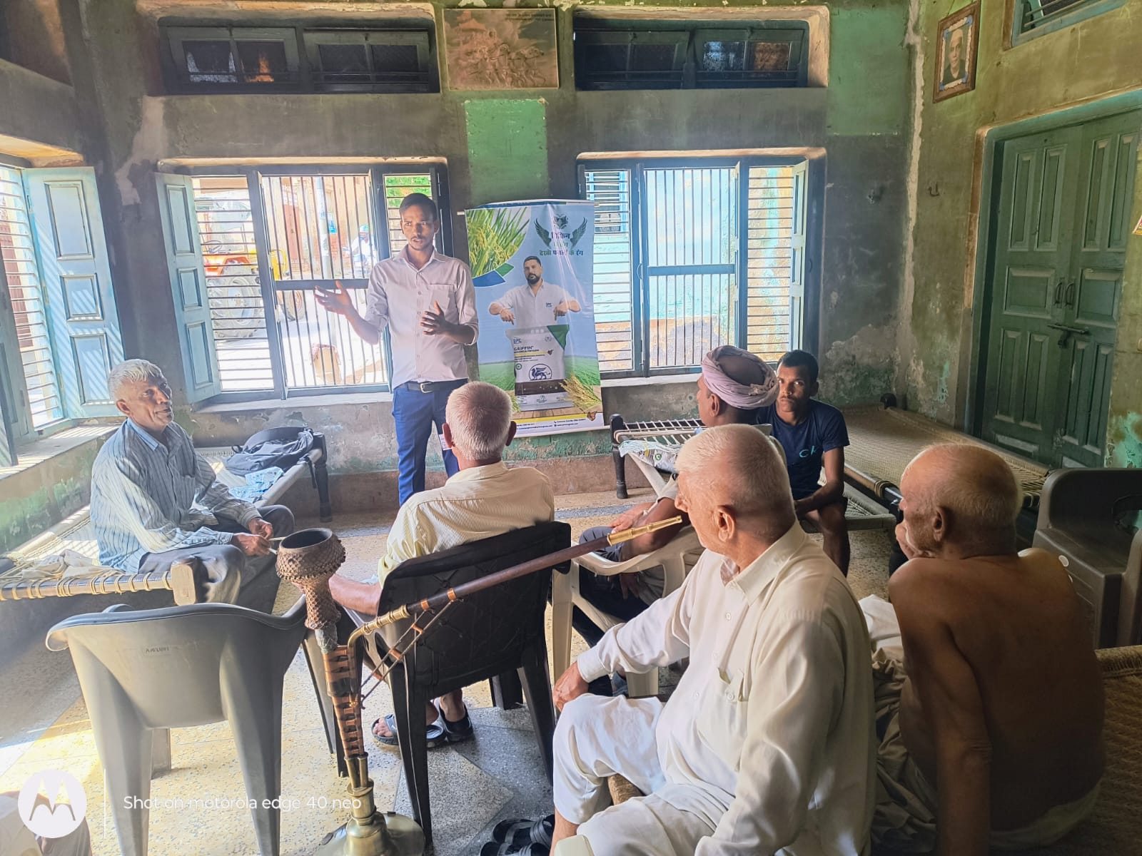 Village-level farmer advisory meeting on crop protection